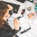 Young Woman Working, Planning, Writing